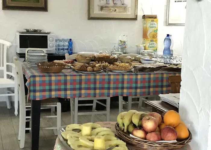 Cala Caterina Bay * Вилласимиус